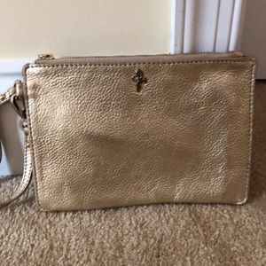 Cole Haan gold clutch. Good condition.
